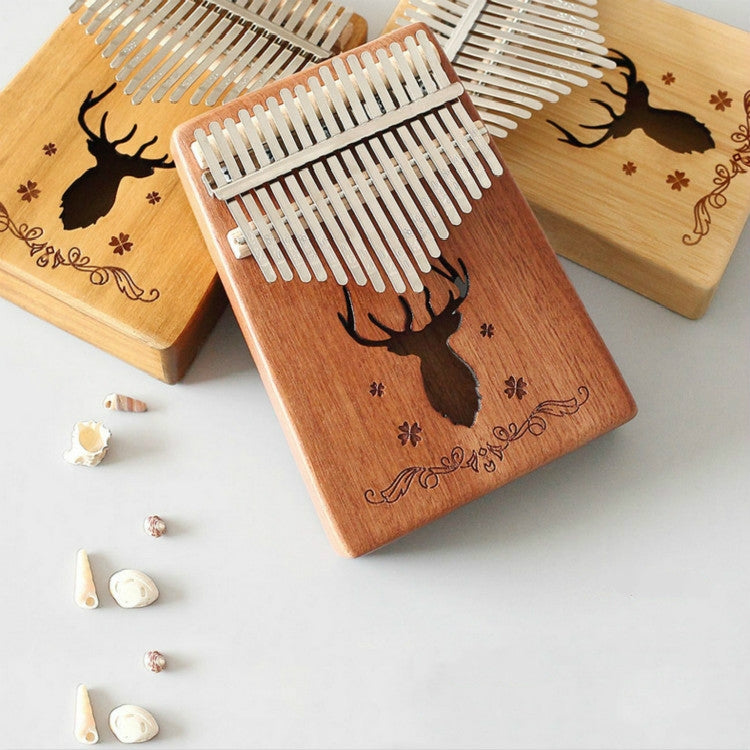 17-tone Kalimba Portable Thumb Piano, Mahogany-Classic Deer, Bamboo-Classic Deer, Mahogany-Sun God, Mahogany-Six-Pointed Star, Mahogany-Blue (Classic Deer), Spruce-Classic Deer, White-Classic Deer, Acacia-Classic Deer, Sapele-Classic Deer              ...